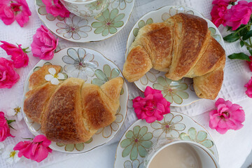 Elegant Outdoor Tea Time with Croissant