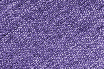 Purple Jacquard fabric with large loose diagonal woven, coarse weave texture upholstery cloth. Textile background, furniture textile material, wallpaper, backdrop. Cloth structure close up, macro.