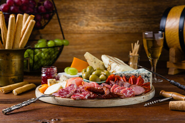 Meat and cheese board. A mix of exquisite cheeses and cold cuts from many countries.