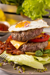 Beef burger without a bun with a fried egg