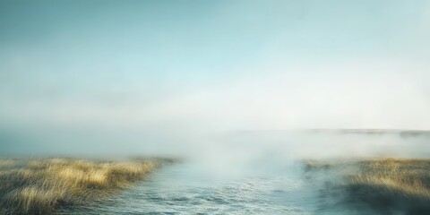 Fototapeta premium A serene expanse of deep blue-green waters shrouded in misty veils, with gentle ripples revealing glimpses beneath its tranquil surface