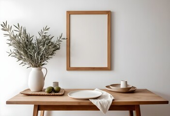 Minimalist Home Decor Wooden Table Setting with Greenery and Blank Frame