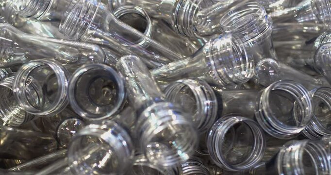 Plastic preforms for bottles manufacturing process
