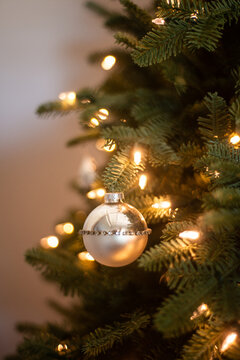 small simple ball on xmas tree with lights