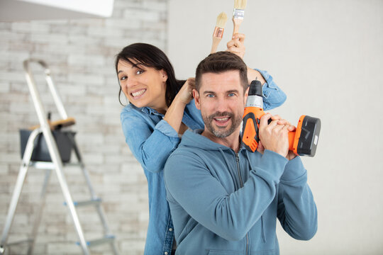 creative young couple renovating their house