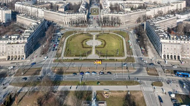 Krak&oacute;w, Poland.  Plac Centralny (Central Square) in Nowa Huta district, with traffic. One of only two entirely build socialist realist settlements in the world. Aerial view. Time lapse. Speed x 4