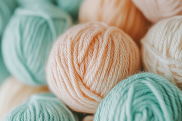 Colorful yarn balls in pastel shades for knitting and crochet enthusiasts