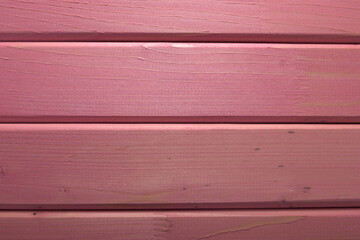 simple background of wooden planks in pink color