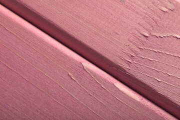 simple background of wooden planks in pink color