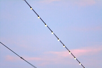 Serene string lights against dusk background