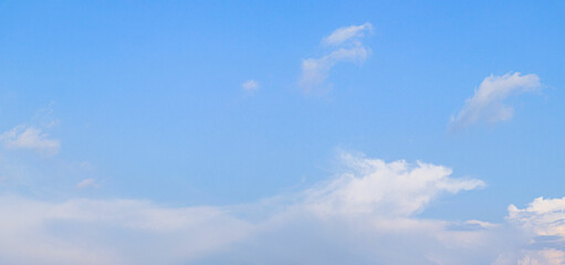 Soft Clouds Drifting in Blue Sky