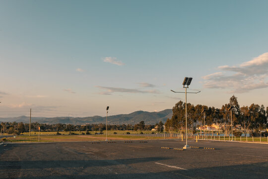Empty car park with solar street lights