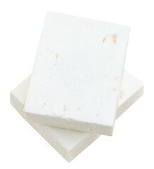 Feta cheese isolated.  Greek fitaki cheese pieces on white background. Fresh soft cheese block Top...