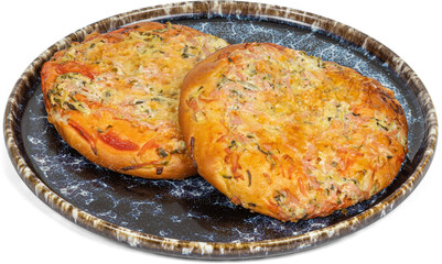 There are two delicious pizzas placed on a plate against a white background