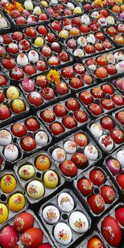raditional Hand-Painted Easter Eggs Display, Colorful Festive Market Stall with Intricate Designs