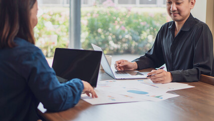 business collaboration, financial analysis, and teamwork, professionals reviewing financial reports...