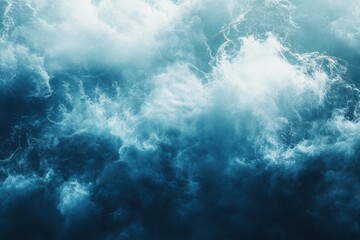 Ocean waves, churning teal and white.