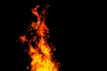 fire texture on black background, large fire photographed at night