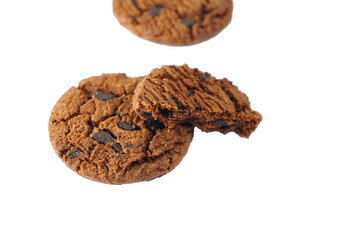 crumbs and broken chocolate cookies isolated on a white background