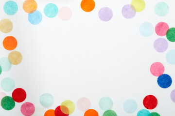 Colorful confetti frame on white background