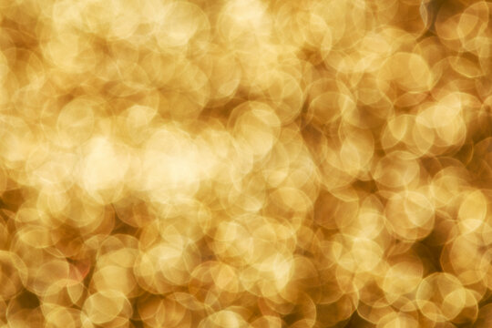 Abstract gold bokeh background