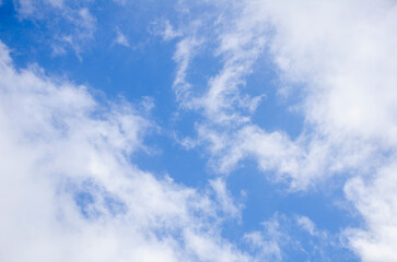White puffy clouds against blue sky