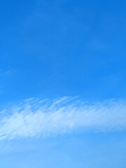 Fototapeta premium Blue sky with white fluffy clouds skyscape 