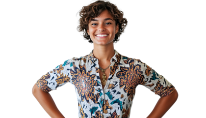 A woman wearing a floral shirt stands confidently with her hands on her hips, exuding a sense of empowerment and style