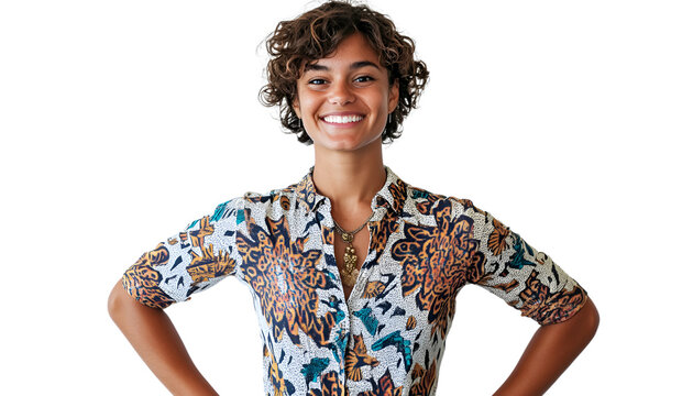 A woman wearing a floral shirt stands confidently with her hands on her hips, exuding a sense of empowerment and style