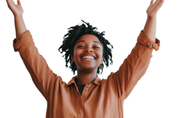 A woman joyfully raises her arms in the air, expressing happiness and freedom