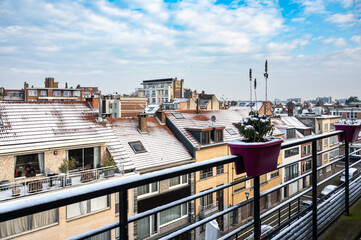 Rooftops and terraces covered with snow, high angle view of Jette, brussels Capital Region, Belgium