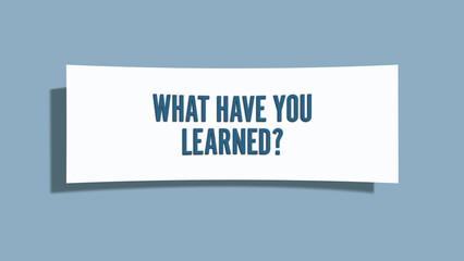 What have you learned.. A card isolated on blue background.