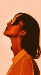 Fototapeta premium Woman in sunglasses with artistic lighting