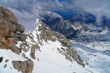Snowy view of the summit of the Zugspitze, the highest mountain top in Germany in the Bavarian Alps region, in summer