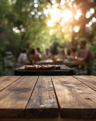 Rustic wooden table with barbecue grill and happy people enjoying summer picnic in garden