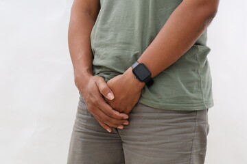 Close up young man holding his genitals cause pain, prostate cancer, premature, ejaculation,...