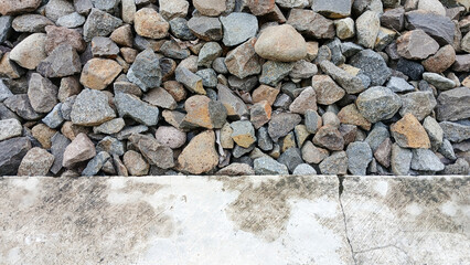 Close up of rough stones arranged randomly in the background. background concept.