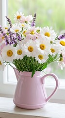 Fototapeta premium Fresh bouquet of daisies and lavender in a pastel pink watering can by a sunny window
