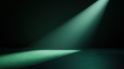 Fototapeta premium Dark green spotlight illuminating empty stage.