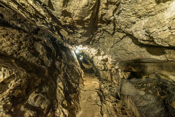 Ancient underground cave gruta de san pedro in atocha bolivia with beautiful stone shapes, stalactites and groundwater landscape
