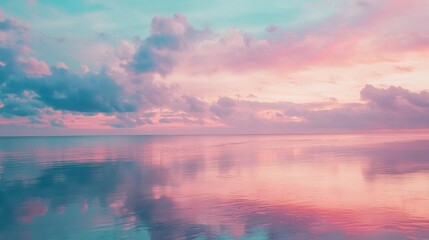Tranquil Ocean Sunset with Pastel Colors and Reflective Water Surface