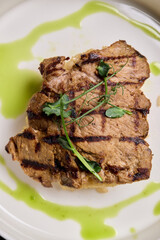Deliciously Grilled Chicken Infused with Fresh Herbs Presented on a Minimalist Plate Design