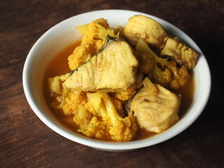 Thai sour curry with king mackerel and cauliflower