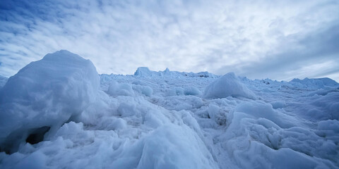 Glacial Ice Field with Broken Snow and Ice Formations