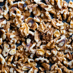 English walnut halves spread out, close-up from above.
