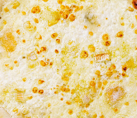 Delicious cheesy dish topped with golden crust in a warm setting