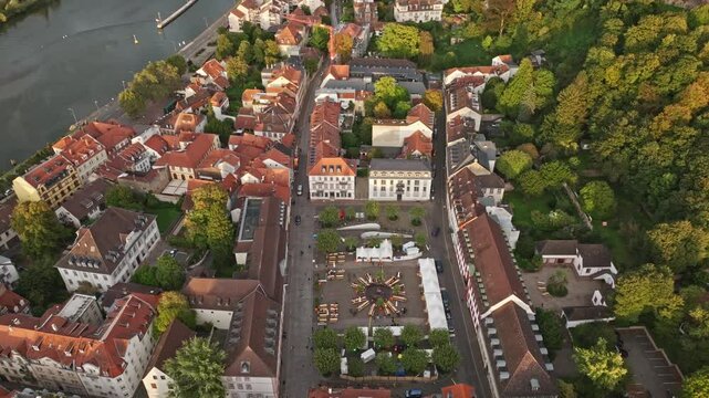 A breathtaking aerial drone view of Karlsplatz in Heidelberg, Germany, showcasing its historic charm and beautifully designed open square.