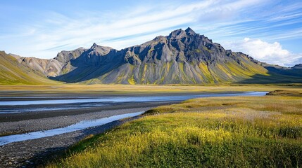 Majestic Mountain Landscape with River and Lush Greenery in Iceland