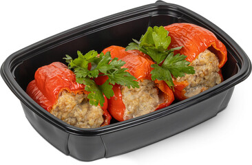 A black container filled with stuffed peppers and parsley