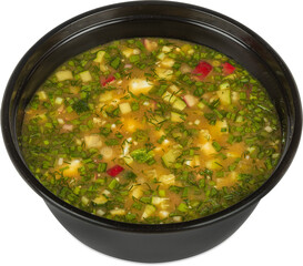 Closeup of a bowl of delicious soup on a plain white background